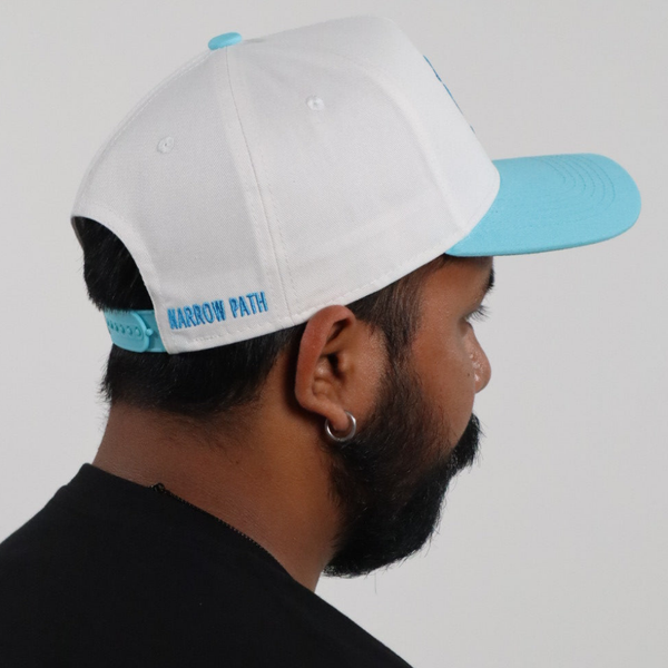 LOVE NEVER FAILS EMBROIDERED SNAPBACK HAT