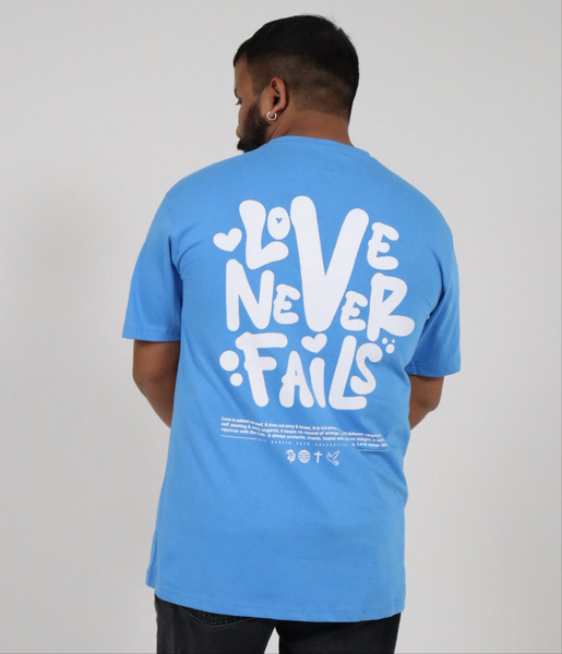 LOVE NEVER FAILS TEE BLUE